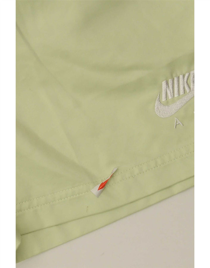 Shorts esportivos femininos Nike UK 10 pequeno poliéster verde
