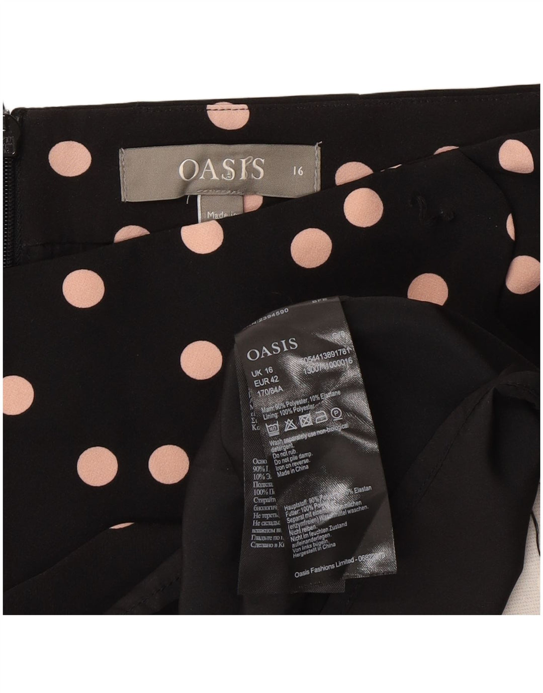 Minissaia feminina Oasis Reino Unido 16 grande W34 poliéster preto com bolinhas