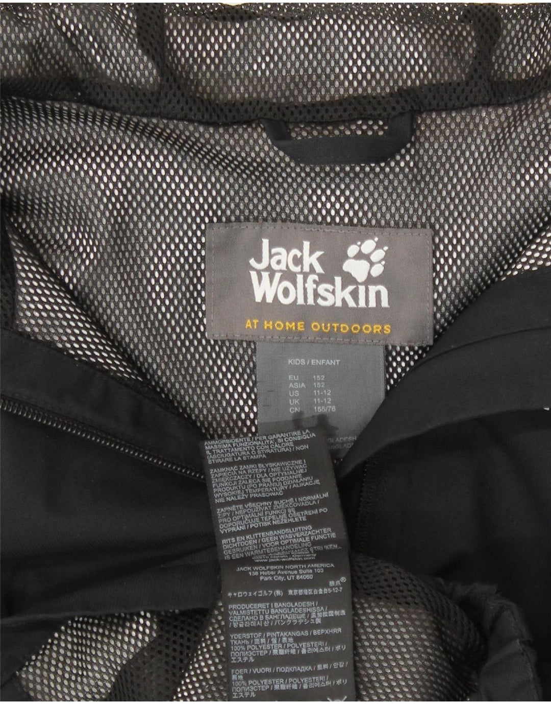 Jaqueta de chuva com capuz gráfico Jack Wolfskin Boys 11-12 anos poliéster preto