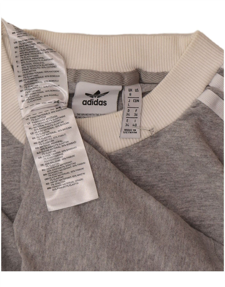 Top feminino Adidas manga comprida UK 8 pequeno algodão cinza