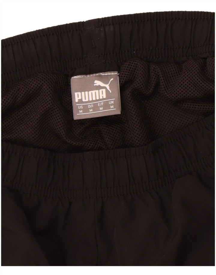 Calça de treino masculina Puma Graphic Joggers poliéster preto médio