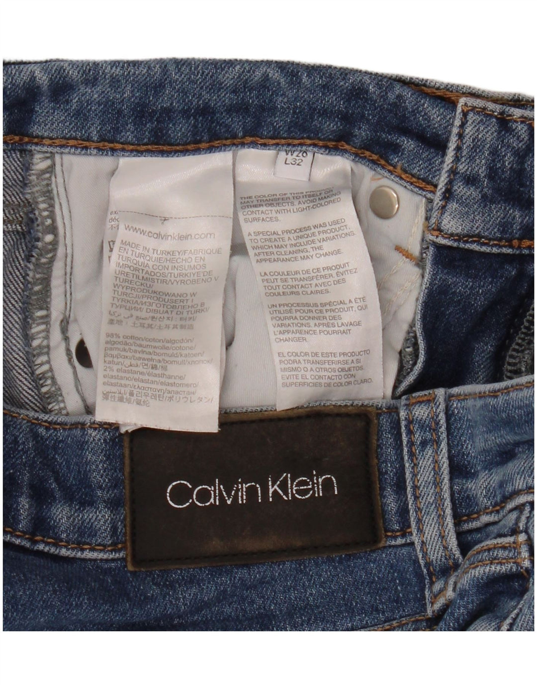 Calça jeans reta feminina Calvin Klein W26 L26 algodão azul