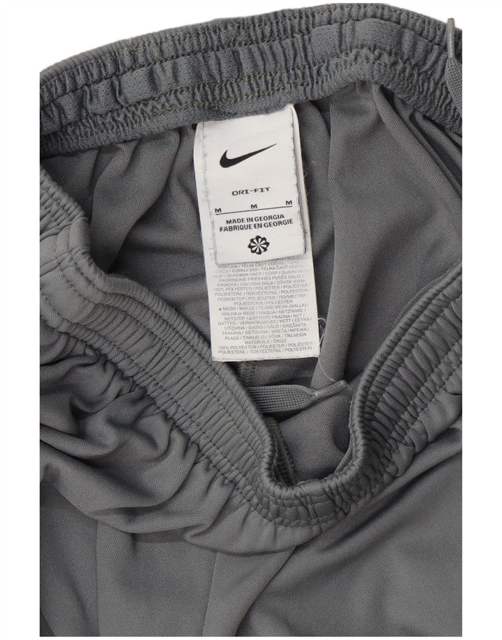 Calça de treino masculina Nike Dri Fit cinza médio colorblock poliéster