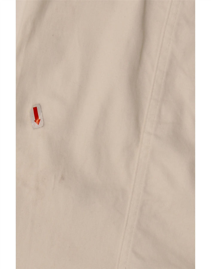 Saia feminina MOSCHINO cintura alta evasê Reino Unido 14 W30 L23 algodão branco