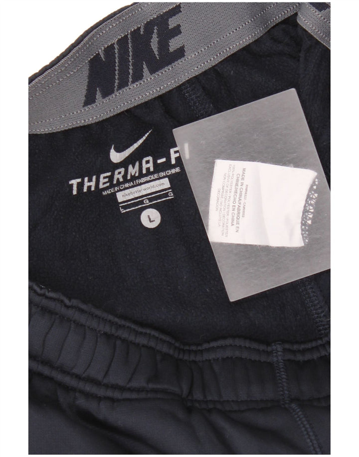 Calça de treino masculina Nike Therma-Fit grande poliéster azul marinho