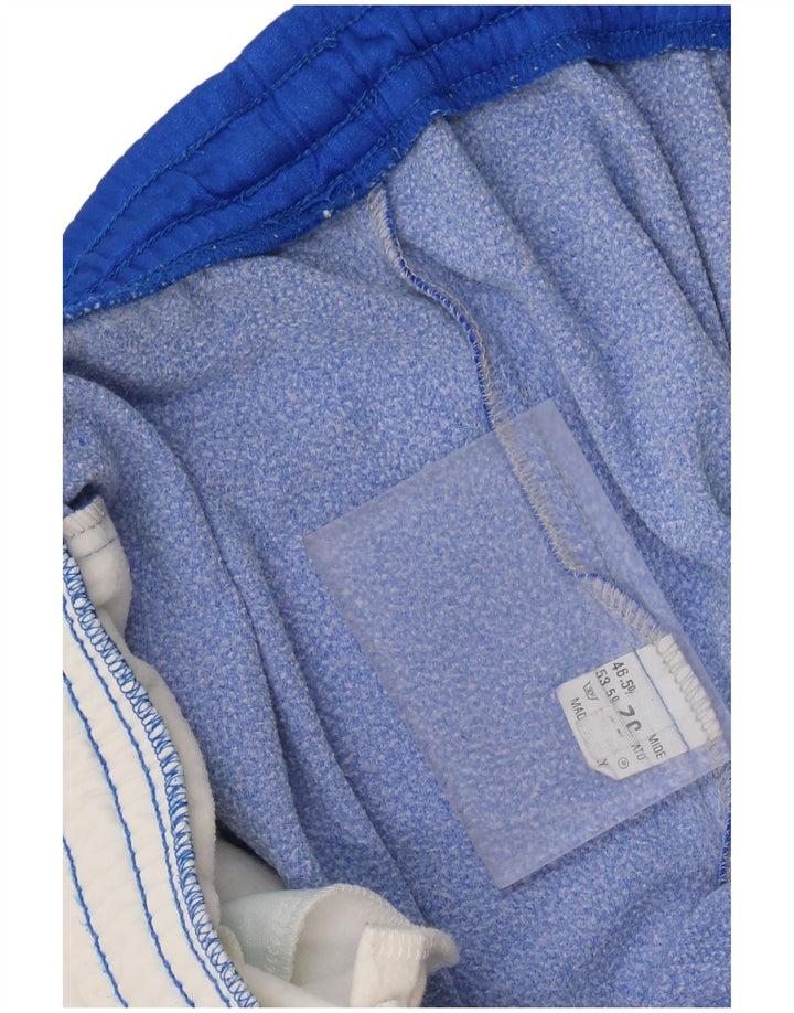 Calça de treino masculina ASICS Graphic Joggers IT 52 XL azul colorblock