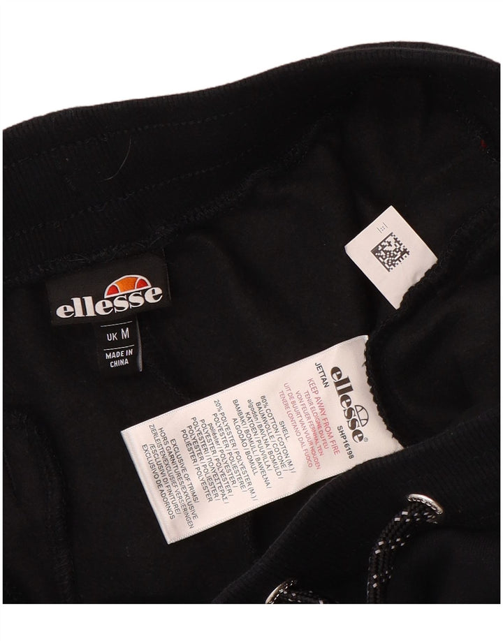 Calça esportiva masculina Ellesse com estampa gráfica, joggers de algodão preto médio