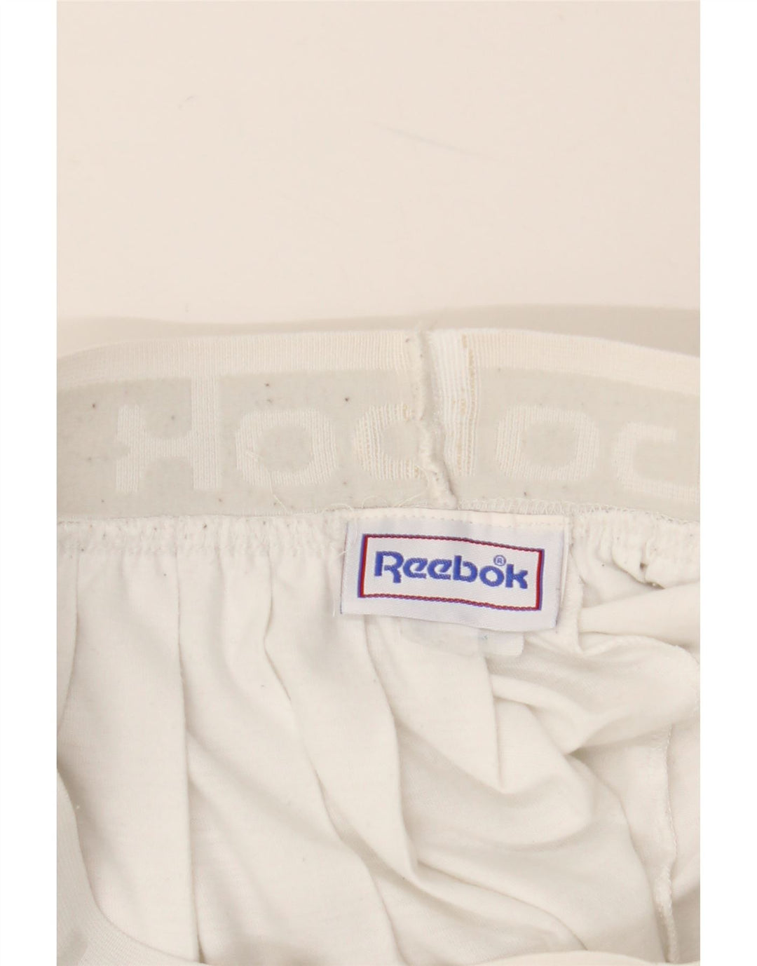 Saia feminina REEBOK para tênis gráfico UK 10 pequena poliéster branco
