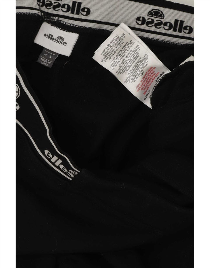 Calça de treino masculina Ellesse com estampa gráfica grande de algodão preto