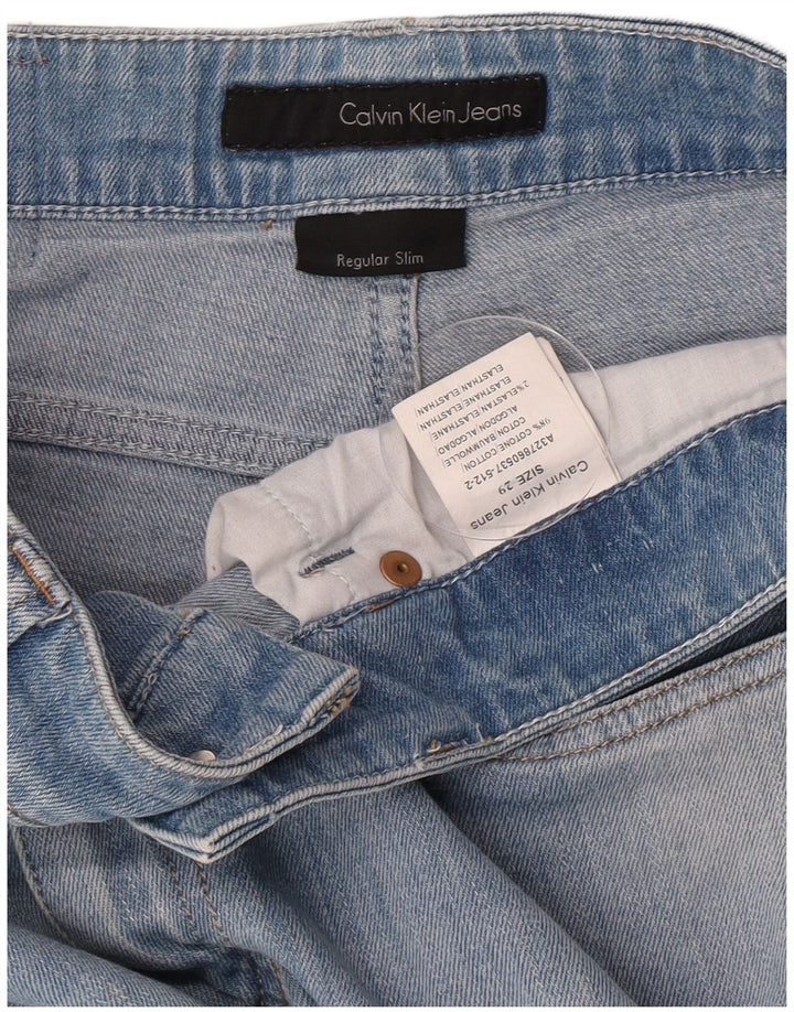 Calvin Klein Calça jeans feminina slim regular fit W29 algodão azul médio