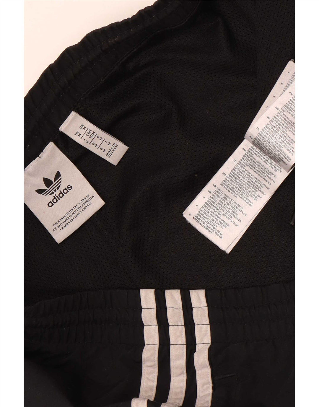 Calça de treino masculina Adidas Joggers médio preto colorblock poliéster