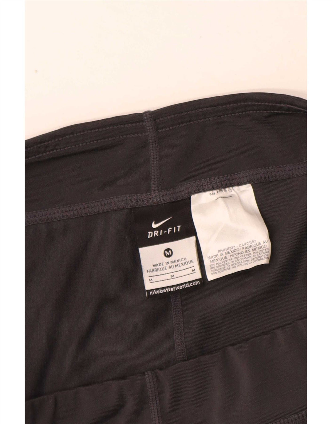 Shorts esportivos femininos Nike Dri Fit UK 12 poliéster preto médio