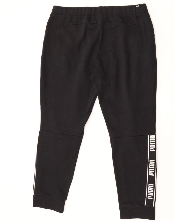 Calça esportiva masculina Puma Graphic Joggers grande preta