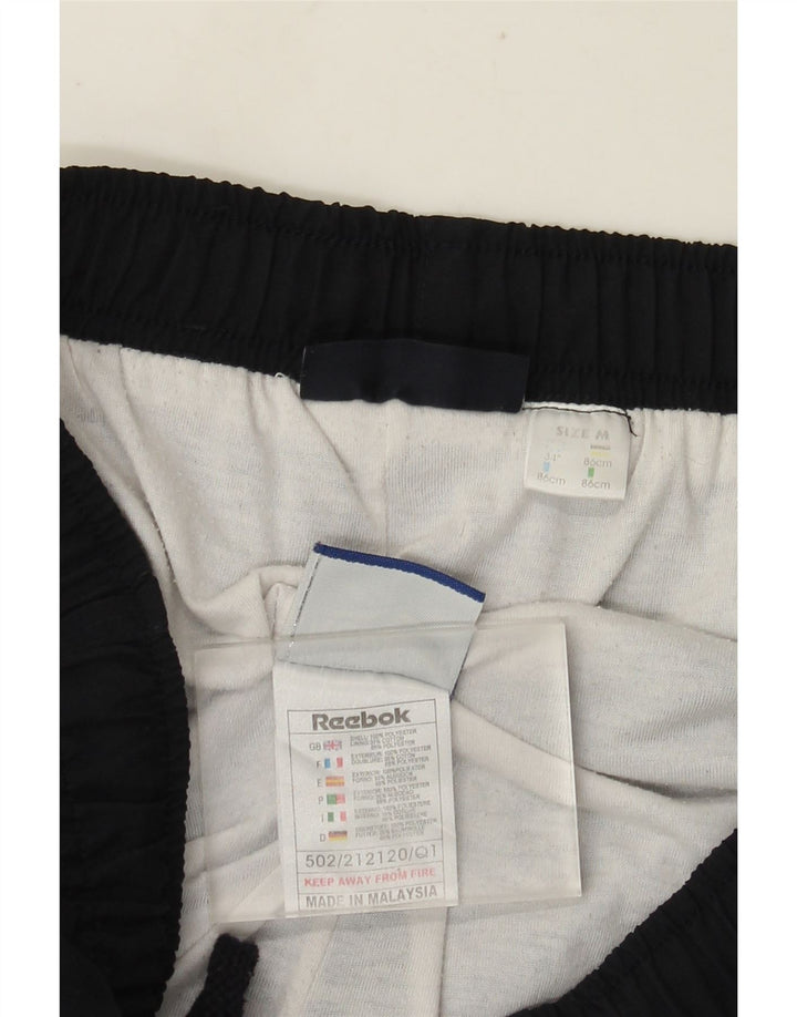 Calça de treino masculina Reebok médio azul marinho poliéster