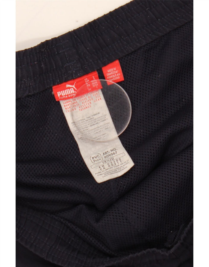 Calça de treino masculina Puma Graphic grande poliéster azul marinho