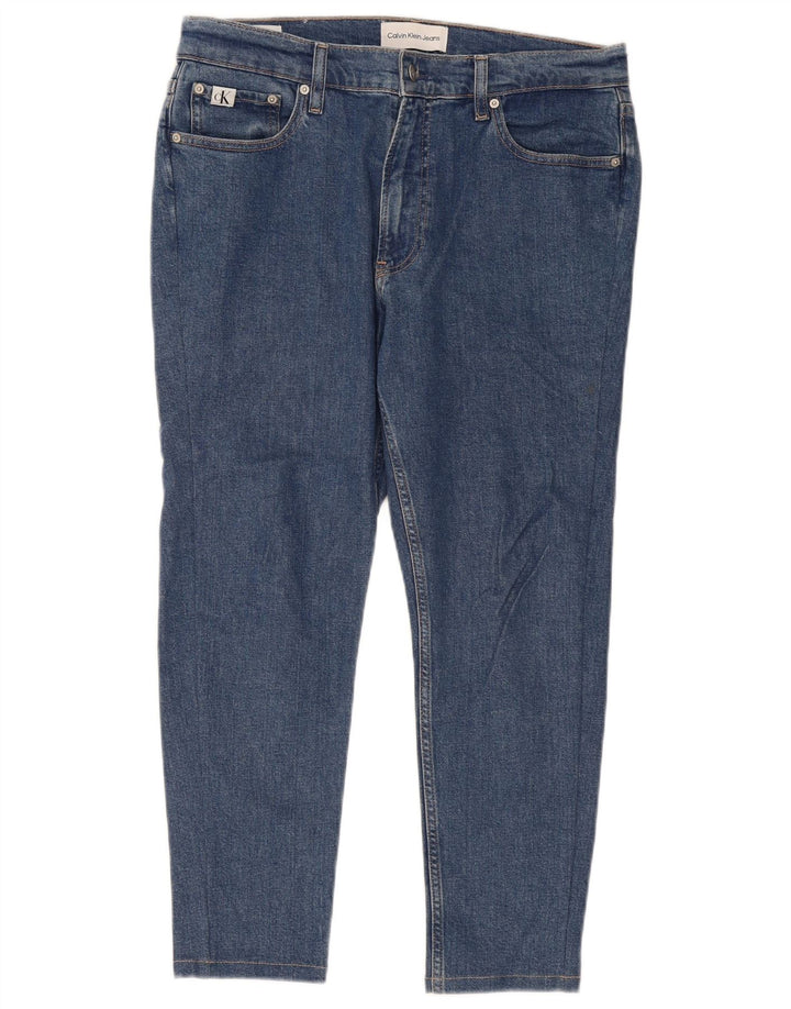 Calça jeans masculina Calvin Klein cortada W32 L25 algodão azul