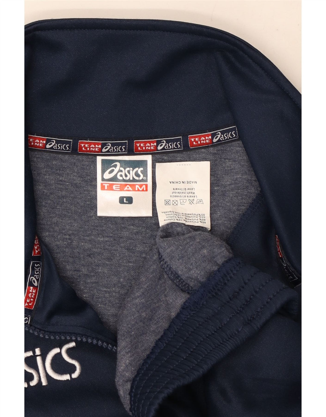 Suéter masculino Asics com zíper e gola grande azul marinho poliéster