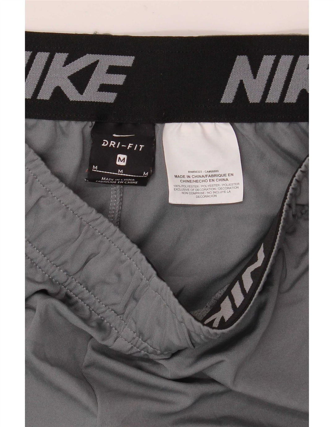 Shorts esportivos Nike masculinos Dri Fit Graphic cinza médio poliéster