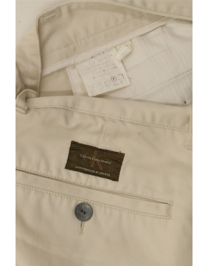 CALVIN KLEIN Mens Tapered Chino Trousers W34 L34 Off White Cotton Vintage Calvin Klein and Second-Hand Calvin Klein from Messina Hembry 