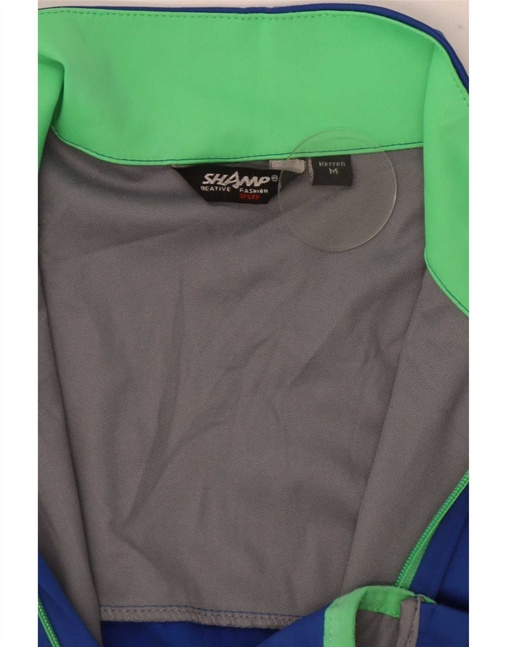 Jaqueta masculina de agasalho Shamp com bloco colorido azul médio