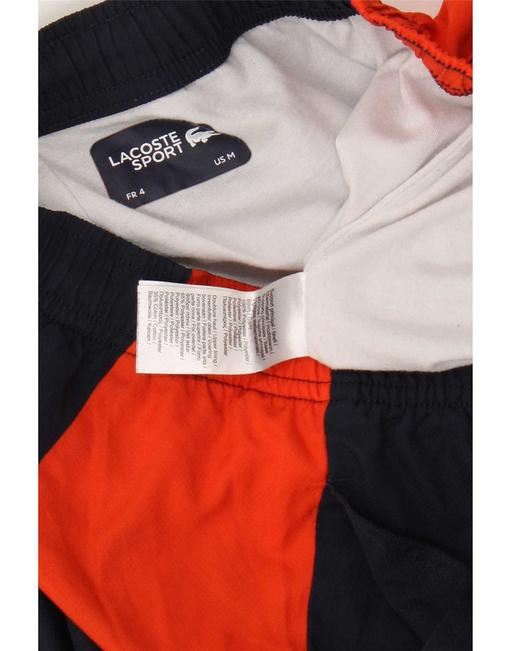 Calça esportiva masculina Lacoste tamanho 4 azul marinho médio colorblock