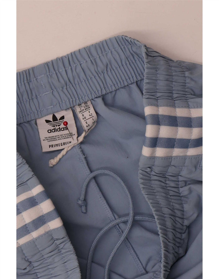 Calça de treino feminina Adidas Joggers UK 14 poliéster azul médio