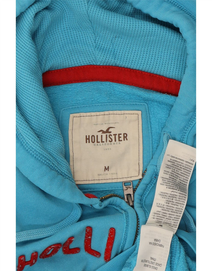 Suéter feminino com capuz e zíper gráfico HOLLISTER Reino Unido 14 algodão azul médio