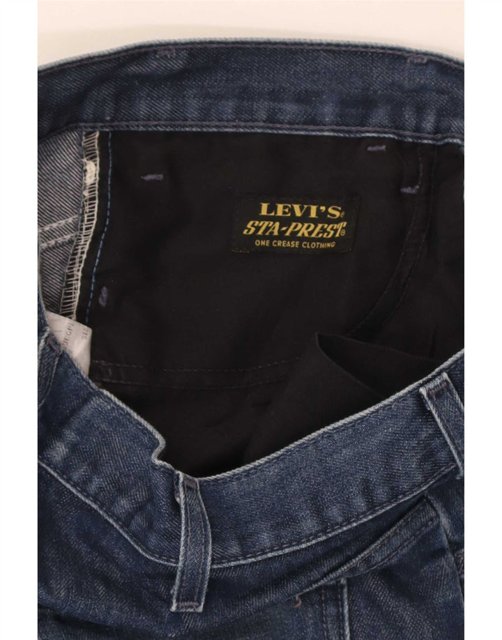 Calça jeans reta masculina Levi's desgastada W33 L34 azul algodão
