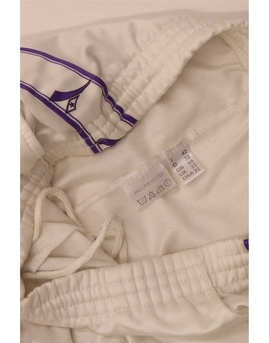 Calça de treino feminina Diadora UK 10 poliéster branco pequeno