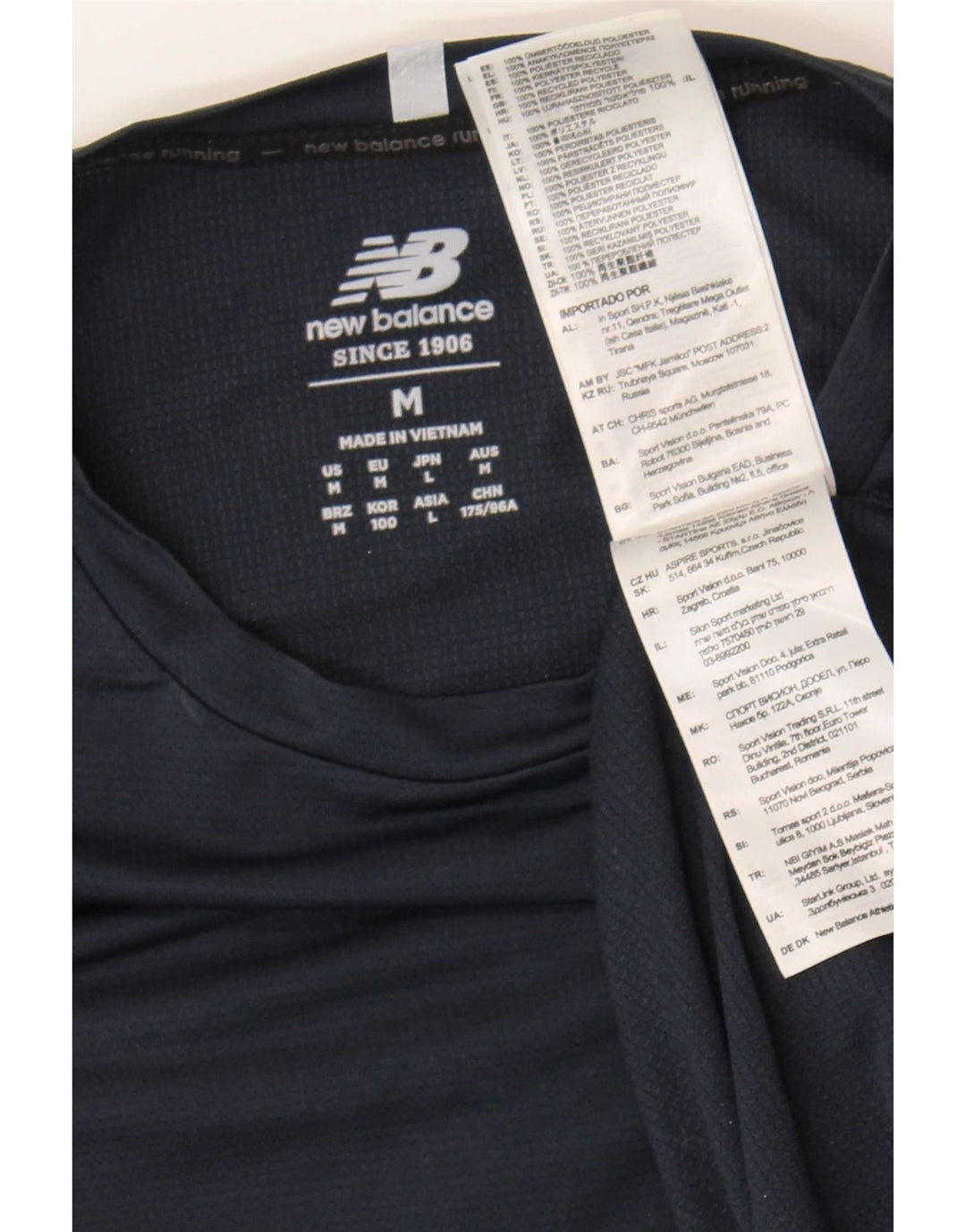 Top masculino New Balance manga comprida poliéster azul marinho médio