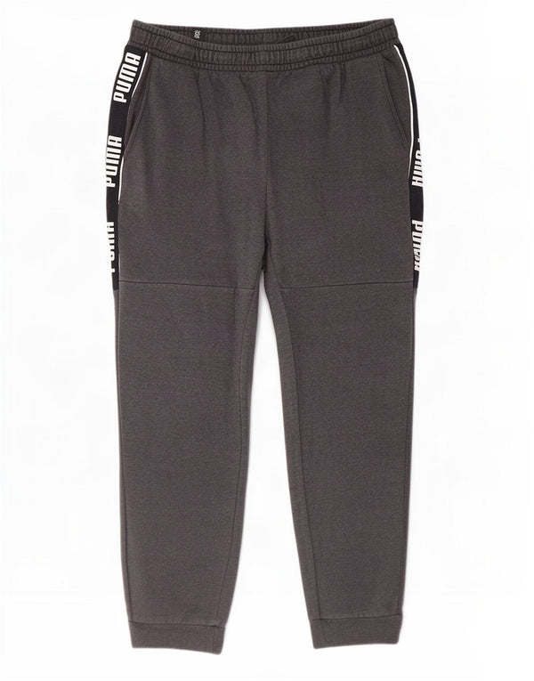 Calça esportiva masculina Puma Graphic Joggers XL cinza colorblock algodão
