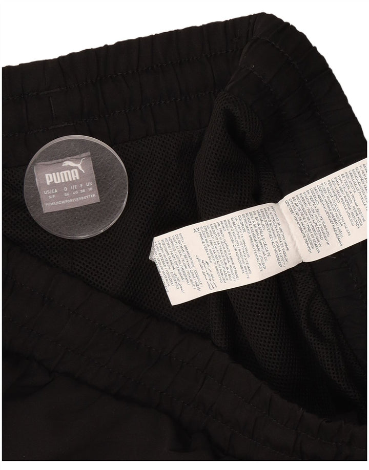 Shorts esportivos femininos Puma UK 10 pequeno poliéster preto