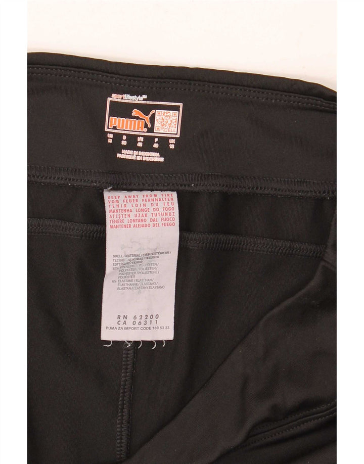 Calça de treino feminina Puma Flare UK 12 poliéster preto médio