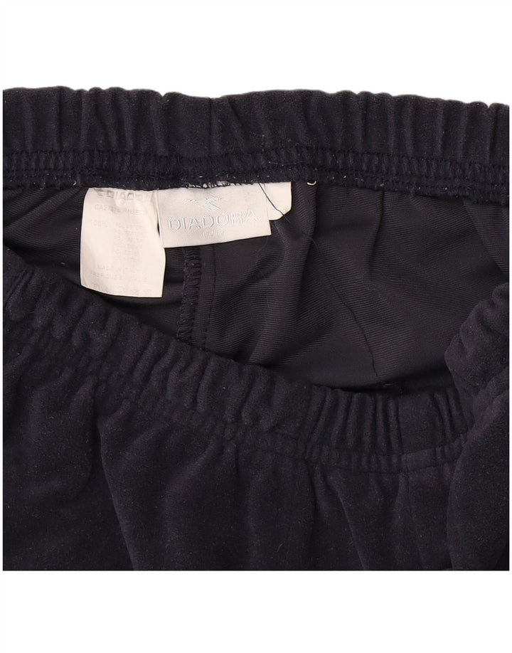 Calça de treino feminina de veludo Diadora UK 8 poliéster azul marinho pequeno