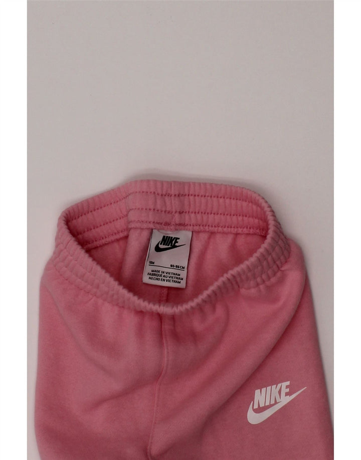 Calça de treino NIKE para bebês meninas com estampa gráfica 12 a 18 meses rosa