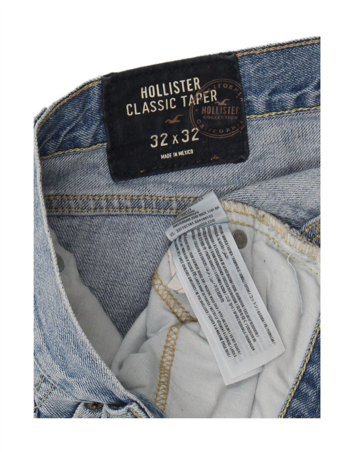 HOLLISTER Mens Distressed Classic Fit Tapered Jeans W32 L32 Blue Cotton Vintage Hollister and Second-Hand Hollister from Messina Hembry 