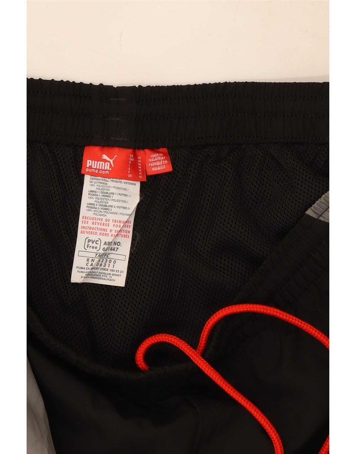 Calça de treino masculina Puma médio preto colorblock poliéster