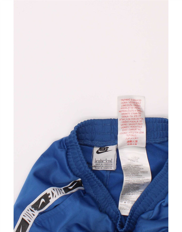 Shorts esportivos gráficos Nike Boys 6-7 anos grande azul colorido bloco de poliéster