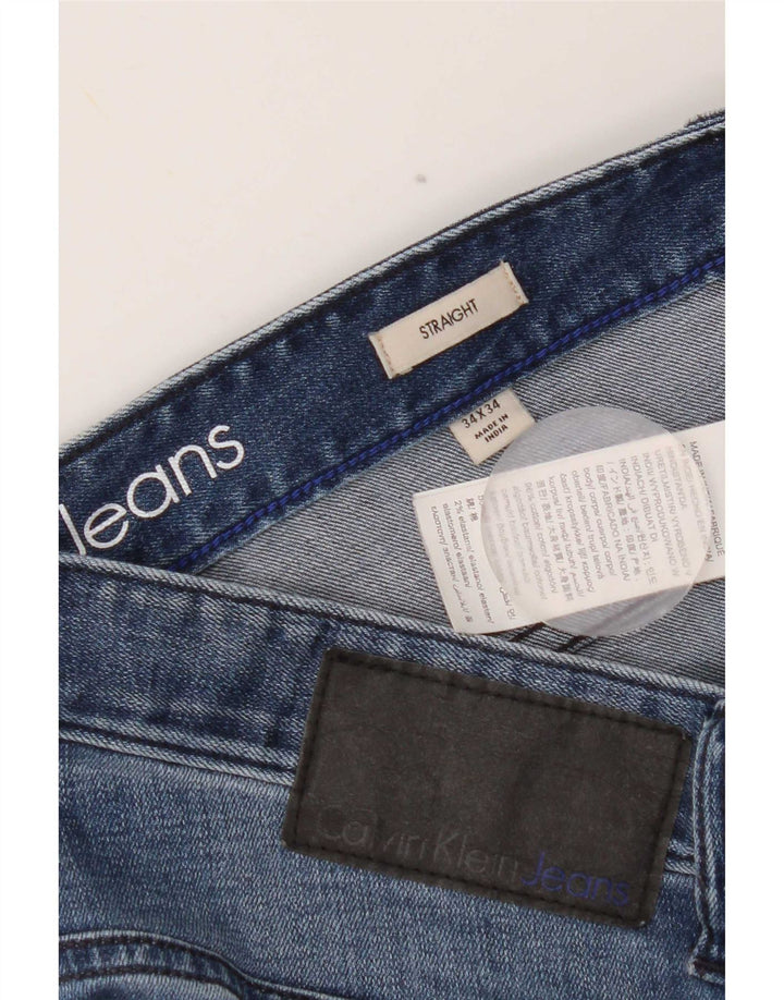 Calça jeans reta masculina Calvin Klein desgastada W34 L34 azul algodão