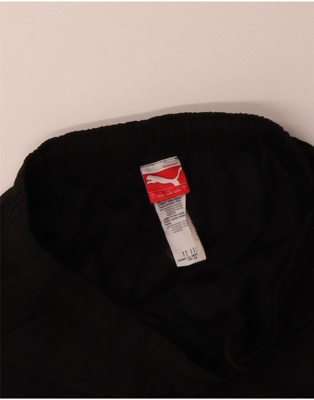 Calça de treino masculina PUMA Graphic Capri grande poliéster preto