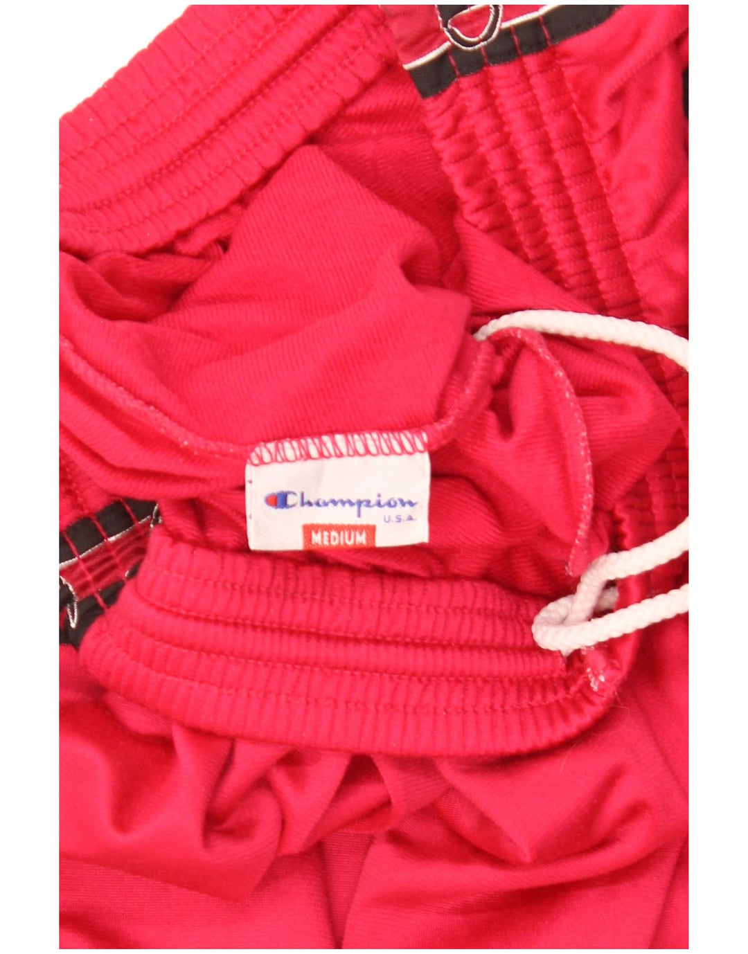 Calça esportiva masculina Champion com estampa gráfica em poliéster colorblock vermelho médio