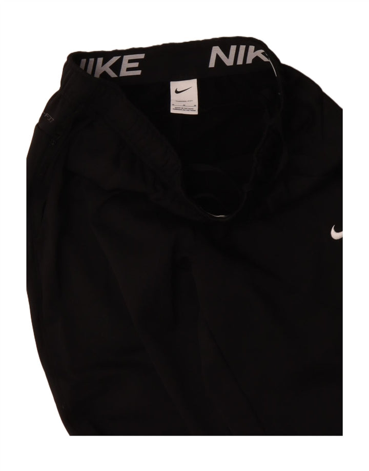 Calça esportiva masculina Nike Therma-Fit de poliéster médio preto