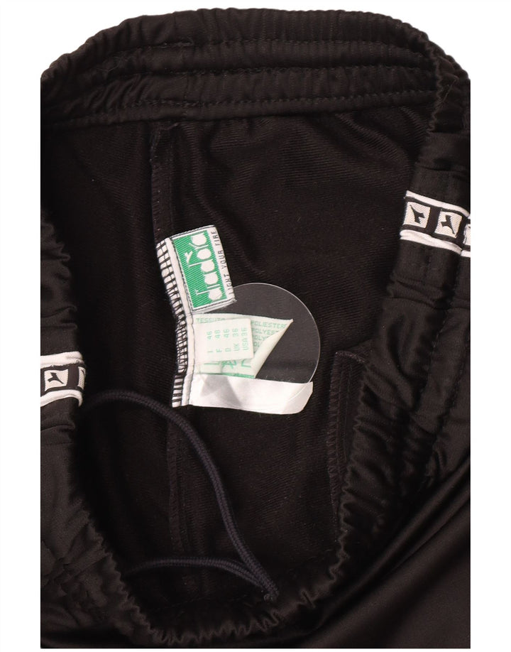 Calças de treino gráfico masculino Diadora UK 36 pequeno poliéster preto