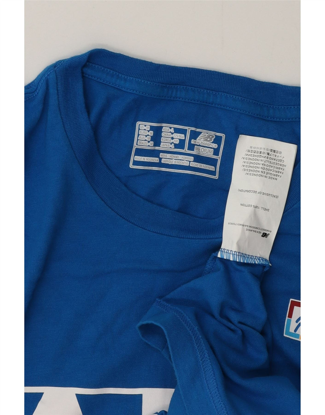 Camiseta gráfica masculina NEW BALANCE de algodão azul médio