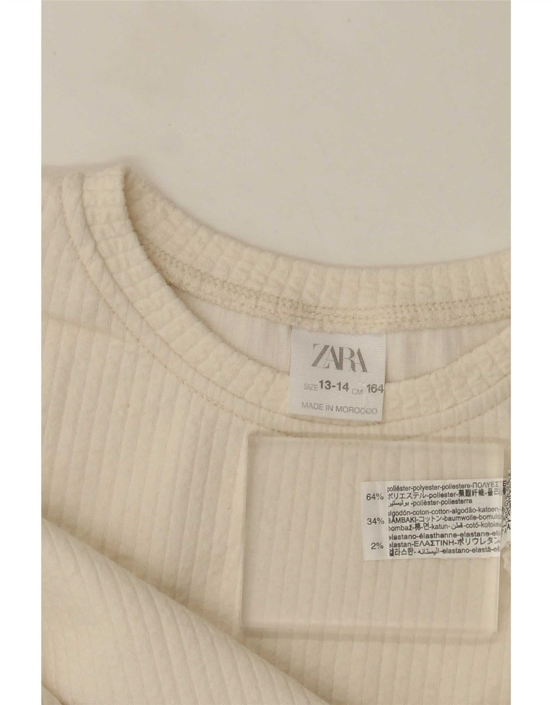 Zara Girls Crop Graphic Top manga comprida 13-14 anos poliéster branco