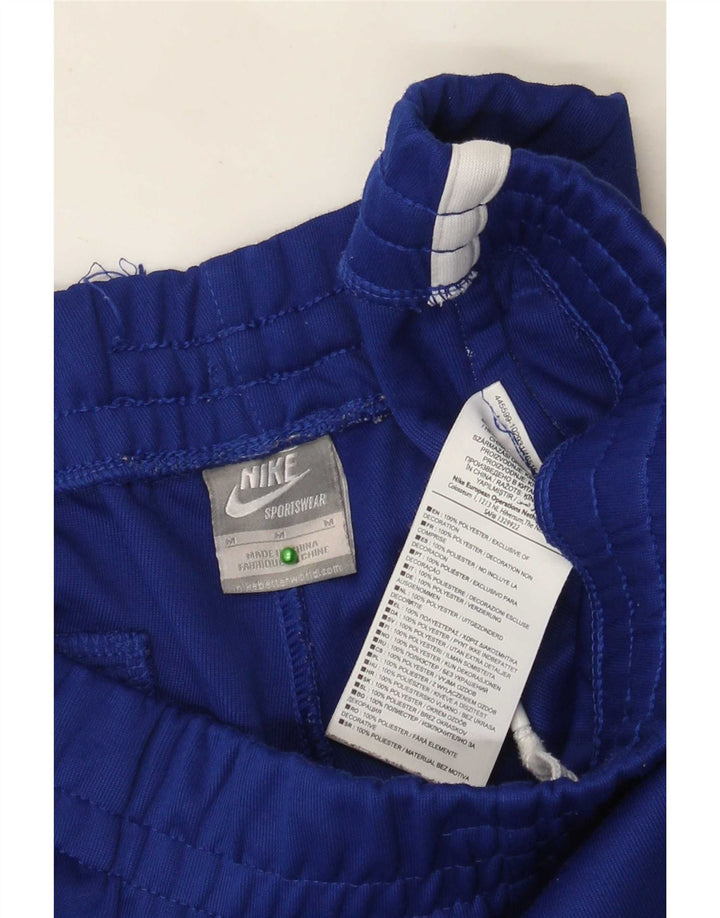 Calça de treino masculina Nike médio azul colorblock poliéster