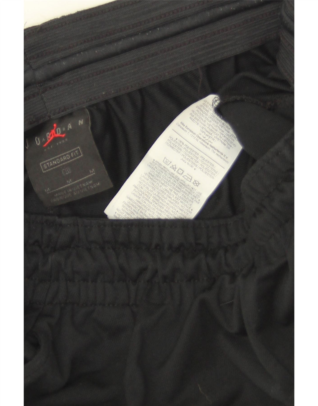 Calça de treino masculina Jordan Standard Fit médio preto colorblock