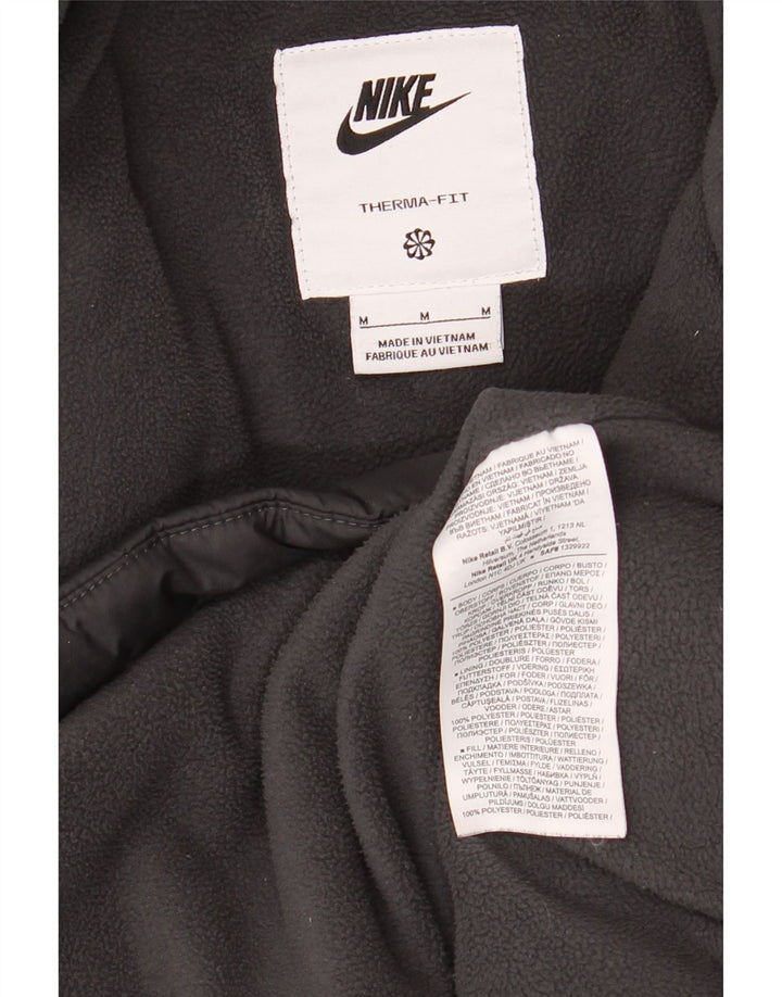 Jaqueta acolchoada com capuz Nike Therma-Fit masculina UK 38 poliéster preto médio