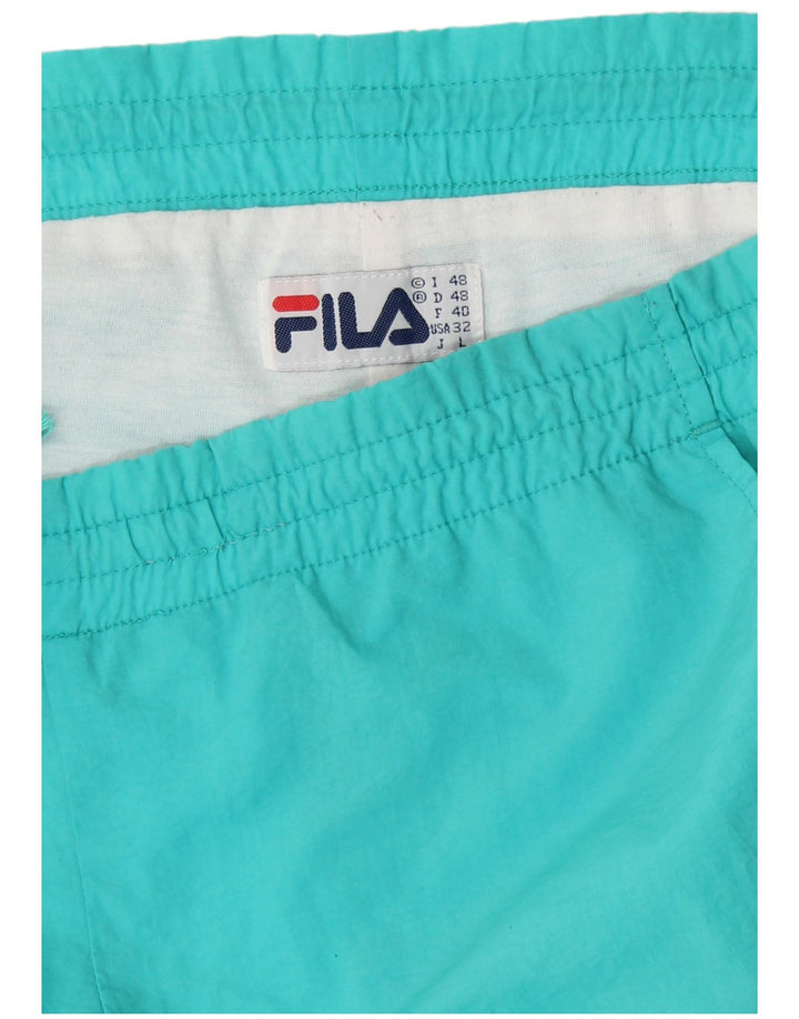 Calça de treino masculina FILA Joggers IT 48 médio turquesa nylon