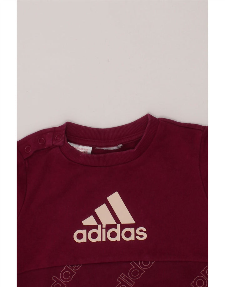 ADIDAS Baby Girls Graphic Sweatshirt Jumper 12-18 Months Maroon Vintage Adidas and Second-Hand Adidas from Messina Hembry 